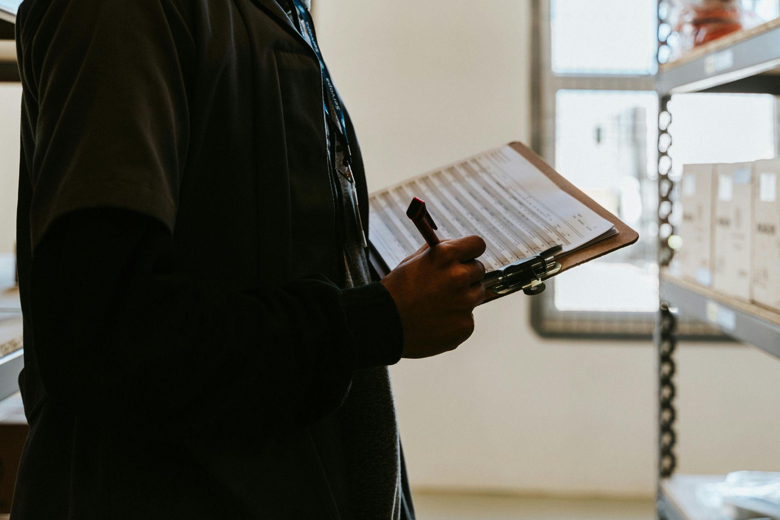 A close-up of a clipboard with an inspection checklist